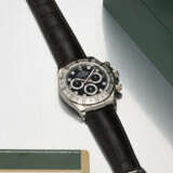 ROLEX. A RARE AND HIGHLY ATTRACTIVE 18K WHITE GOLD AND BAGUETTE DIAMOND-SET AUTOMATIC CHRONOGRAPH WRISTWATCH - photo 2