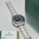 ROLEX. A STAINLESS STEEL DUAL TIME WRISTWATCH WITH SWEEP CENTRE SECONDS, DATE AND BRACELET - фото 2