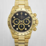 ROLEX. A RARE AND ATTRACTIVE 18K GOLD AND DIAMOND-SET AUTOMATIC CHRONOGRAPH WRISTWATCH WITH BRACELET - photo 1