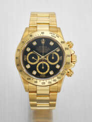 ROLEX. A RARE AND ATTRACTIVE 18K GOLD AND DIAMOND-SET AUTOMATIC CHRONOGRAPH WRISTWATCH WITH BRACELET