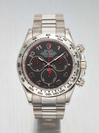 ROLEX. AN ATTRACTIVE AND SPORTY 18K WHITE GOLD AUTOMATIC CHRONOGRAPH WRISTWATCH WITH BRACELET - photo 1