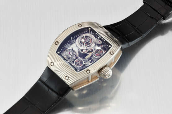 RICHARD MILLE. A UNIQUE 18K WHITE GOLD SKELETONIZED TOURBILLON WRISTWATCH WITH NATURAL MINERAL-SET WHEELS, MADE TO COMMEMORATE THE 150TH ANNIVERSARY OF BOUCHERON - photo 3