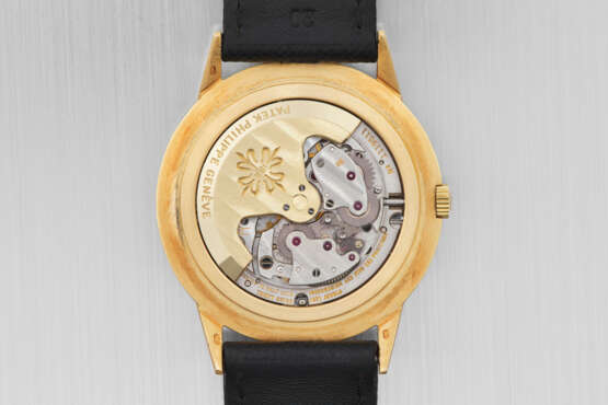 PATEK PHILIPPE. A VERY RARE AND HIGHLY IMPORTANT 18K GOLD AUTOMATIC PERPETUAL CALENDAR WRISTWATCH WITH MOON PHASES, FORMERLY TO PROPERTY OF ANDY WARHOL - photo 6