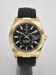 ROLEX. AN ATTRACTIVE 18K GOLD AUTOMATIC ANNUAL CALENDAR WRISTWATCH WITH DUAL TIME, SWEEP CENTRE SECONDS AND DATE