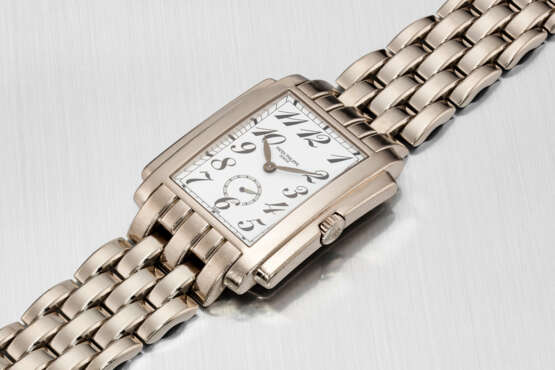 PATEK PHILIPPE. AN ATTRACTIVE AND HEAVY 18K WHITE GOLD WRISTWATCH WITH BRACELET - photo 3