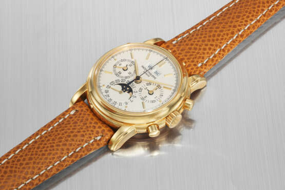 PATEK PHILIPPE. A VERY RARE AND ATTRACTIVE 18K GOLD PERPETUAL CALENDAR CHRONOGRAPH WRISTWATCH WITH MOON PHASES, 24 HOUR INDICATION AND LEAP YEAR INDICATION - фото 3