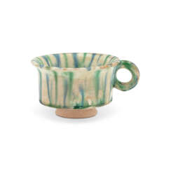 A RARE BLUE, GREEN, AND CREAM-GLAZED POTTERY HANDLED CUP