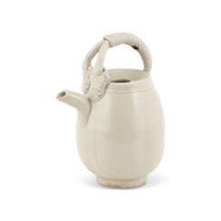 A SMALL DING WHITE-GLAZED MELON-FORM EWER