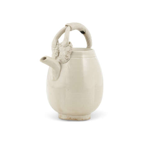 A SMALL DING WHITE-GLAZED MELON-FORM EWER - photo 2