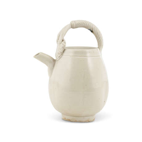 A SMALL DING WHITE-GLAZED MELON-FORM EWER - photo 3