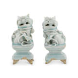 A PAIR OF SMALL QINGBAI BUDDHIST LION-FORM CENSERS - photo 1