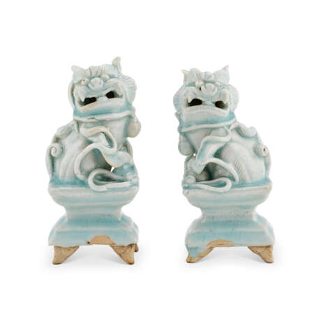 A PAIR OF SMALL QINGBAI BUDDHIST LION-FORM CENSERS - фото 1