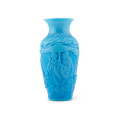 A CARVED PALE-BLUE GLASS 'FIGURAL' VASE