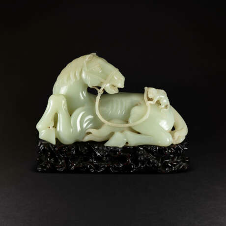 A PALE CELADON JADE ‘HORSE AND MONKEY’ GROUP - photo 1