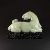 A PALE CELADON JADE ‘HORSE AND MONKEY’ GROUP - photo 2