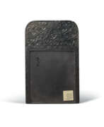 Objects of vertu. A DUAN INSCRIBED 'HEART SUTRA' INK STONE