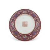 A RARE RUBY-GROUND FAMILLE ROSE 'BATS' DISH - photo 3