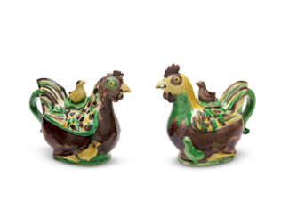 A PAIR OF GREEN, YELLOW AND AUBERGINE-GLAZED BISCUIT HEN-FORM EWERS AND COVERS