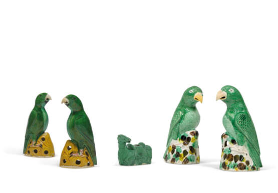 TWO PAIRS OF FAMILLE VERTE BISCUIT PARROTS AND A GREEN-GLAZED BISCUIT RECUMBENT HORSE - photo 1