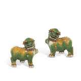 A PAIR OF GREEN, YELLOW AND AUBERGINE-GLAZED BISCUIT BUDDHIST LIONS - фото 1