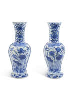 Wanli period. A PAIR OF BLUE AND WHITE 'LOTUS POND' WALL VASES