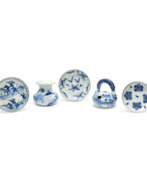 Vietnam. THREE BLUE AND WHITE DISHES, A BLUE AND WHITE VASE AND A BLUE AND WHITE EWER