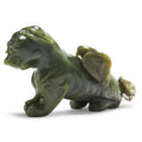 A SPINACH-GREEN CARVING OF AN EAGLE ON A BEAR - фото 2