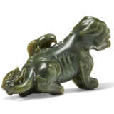 A SPINACH-GREEN CARVING OF AN EAGLE ON A BEAR - photo 5