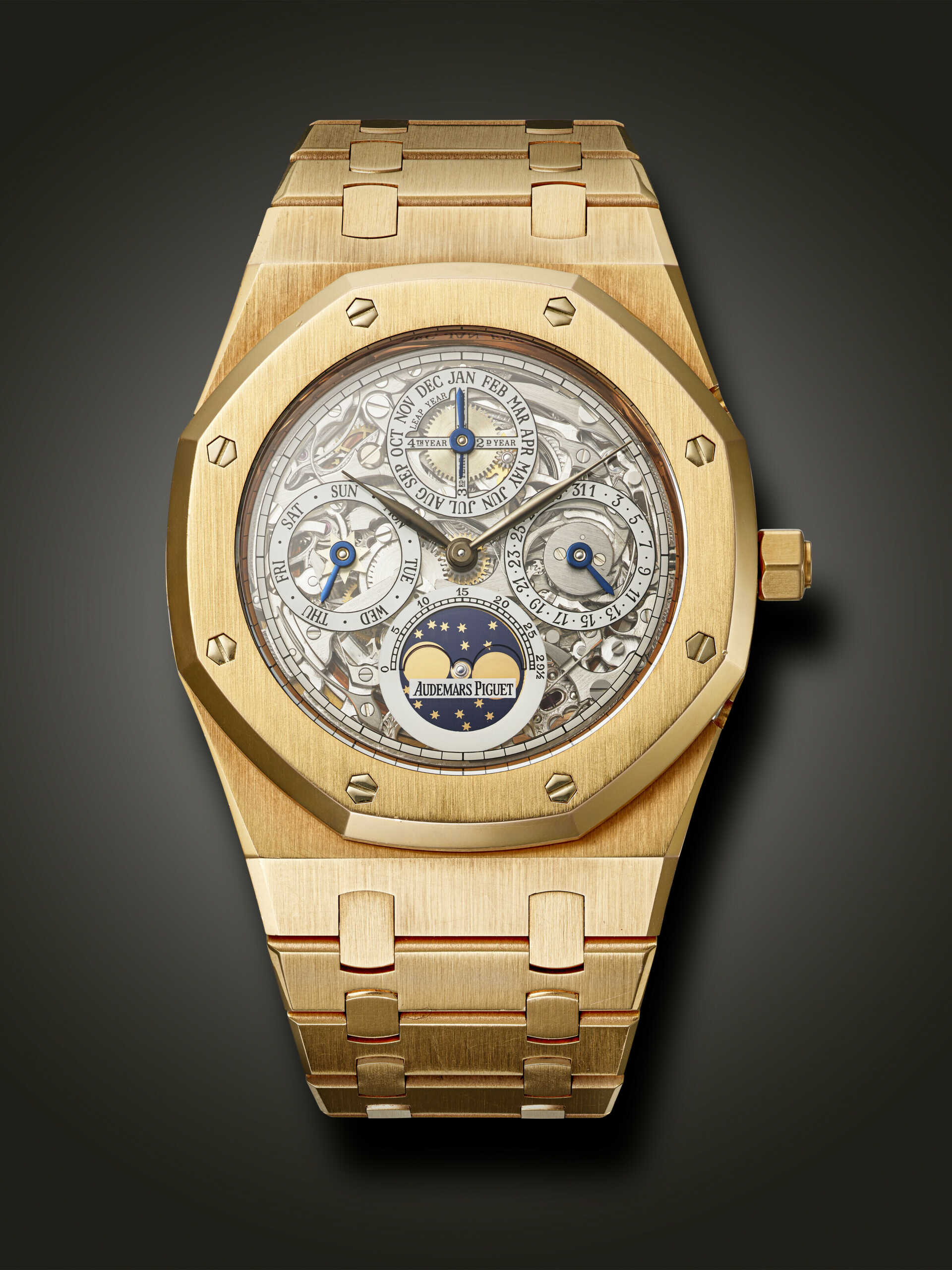 AUDEMARS PIGUET, RARE PINK GOLD SKELETONIZED PERPETUAL CALENDAR 'ROYAL OAK' WITH MOON PHASES, REF. 25829OR