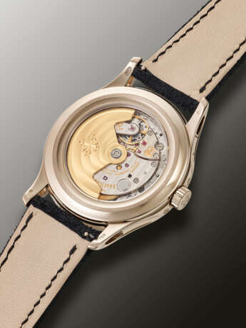 PATEK PHILIPPE, RARE WHITE GOLD ANNUAL CALENDAR, RETAILED BY TIFFANY & CO, REF. 5205G - photo 3