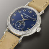 PATEK PHILIPPE, WHITE GOLD AND DIAMOND-SET WRISTWATCH, WITH MOON PHASES, REF.7121/200G-001 - photo 2