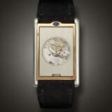 CARTIER, LIMITED EDITION PLATINUM AND PINK GOLD 'TANK BASCULANTE', NO. 54/100, REF. 2500E - фото 5