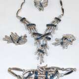 Schmuck-Set 4-teilig, dabei Collier von ca. 43-50 cm tragbar, Armband ca. 19 cm, Ohrringe und Ring, RG 53, Innendurchmesser 16,8 mm, 925er Silber rhodiniert, weiße und saphirfarbene Zirkonia, ca.77 g - photo 1