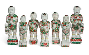 A GROUP OF SEVEN CHINESE EXPORT PORCELAIN BOYS