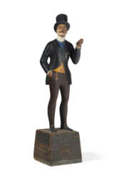 A CARVED AND PAINTED TRADE FIGURE DEPICTING A RACETRACK TOUT