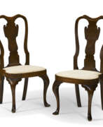 Queen Anne (1702-1714). THE WISTAR FAMILY PAIR OF QUEEN ANNE CARVED WALNUT SIDE CHAIRS