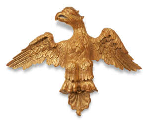A CLASSICAL CARVED GILTWOOD EAGLE