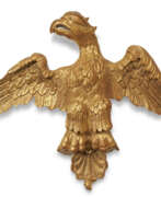 Gilding. A CLASSICAL CARVED GILTWOOD EAGLE
