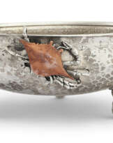 AN AMERICAN SILVER AND MIXED-METAL SERVING BOWL