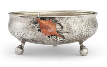AN AMERICAN SILVER AND MIXED-METAL SERVING BOWL