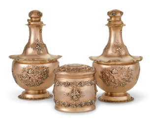 A PAIR OF AMERICAN SILVER-GILT PERFUME FLASKS AND MATCHING TOILET JAR