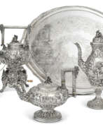 Table service. AN AMERICAN SILVER FIVE-PIECE TEA AND COFFEE SERVICE AND ASSOCIATED SILVER-PLATED TRAY