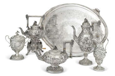 AN AMERICAN SILVER FIVE-PIECE TEA AND COFFEE SERVICE AND ASSOCIATED SILVER-PLATED TRAY
