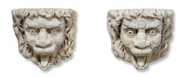 A PAIR OF LARGE MARBLE LION HEADS