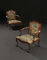 A PAIR OF GEORGE III CARVED FRUITWOOD ARMCHAIRS