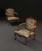 Thomas Chippendale. A PAIR OF GEORGE III CARVED FRUITWOOD ARMCHAIRS