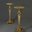 A PAIR OF RESTAURATION ORMOLU AND PARIS PORCELAIN-MOUNTED AMARANTH AND MAHOGANY TORCHERES - Auktionsarchiv