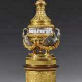 A LOUIS XVI ORMOLU, SILVERED BRONZE AND ROUGE GRIOTTE `PENDULE A CERCLES TOURNANTS` - Foto 2