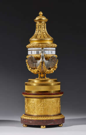 A LOUIS XVI ORMOLU, SILVERED BRONZE AND ROUGE GRIOTTE `PENDULE A CERCLES TOURNANTS` - photo 3