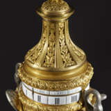 A LOUIS XVI ORMOLU, SILVERED BRONZE AND ROUGE GRIOTTE `PENDULE A CERCLES TOURNANTS` - фото 6